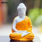 Resin Handicrafted Meditating Buddha Idol (Orange)