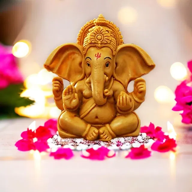 Orange Ganesha Idol Polyresin 10X10X5 Cm