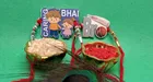 Synthetic 2 Pcs Rakhi with Greeting Card & Roli Chawal 