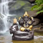 Bal Ganesha Idol Polyresin With 30 Cones 9L X 9.5W X 5H Cm