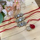 Alloy Designer Couple Rakhi, White, Set Of 1