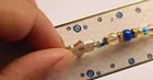 Thread Rakhi with Greeting Card & Roli Chawal 