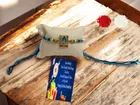 Metal Rakhi with Greeting Card & Roli Chawal 