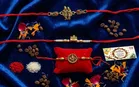 Radha Krishna Ganes Ji Metal Rakhi 