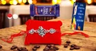 Combo of Metal Rakhi, Greeting Card, Roli  & Chocolate 