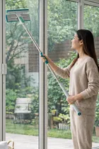 2-in-1 Window Cleaner featuring a squeegee and a microfiber scrubber