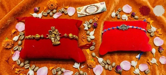 Radha Krishna Sri Ram Metal Rakhi (Multicolor, Pack of 2)