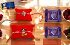 Metal 2 Pcs Rakhi with Greeting card, Roli & 2 Pcs Chocolate 