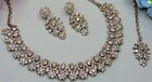 Dazzling Blend of golden Crystals and premium colour Kundan Partywear Necklace Set for Women 
