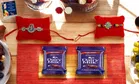 Metal 2 Pcs Rakhi with Greeting card, Roli & 2 Pcs Chocolate 