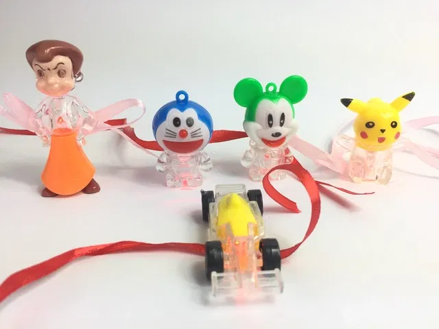 Plastic Cartoon Rakhi with Lights, Diya & Chawal Roli Pack (Multicolor, Pack of 5)