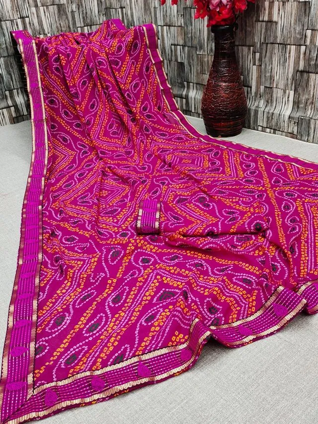 कानूड़ा फैंसी विमेंस जॉर्जेट फ्लावर प्रिंटेड साड़ी (पिंक, 5.5 M) (K10)
