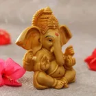 Orange Ganesha Idol Polyresin 10X10X5 Cm