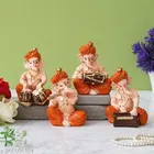 Resin God Ganesha Idol (Orange & Beige, Set of 4)